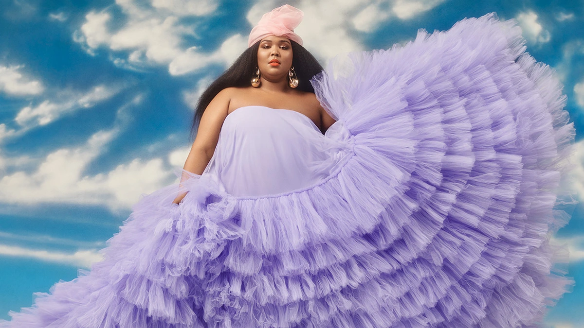 lizzo purple dress Lizzo Rocks Purple Dress With High Slit While At Pre-Met Gala Bash Hollywood Life