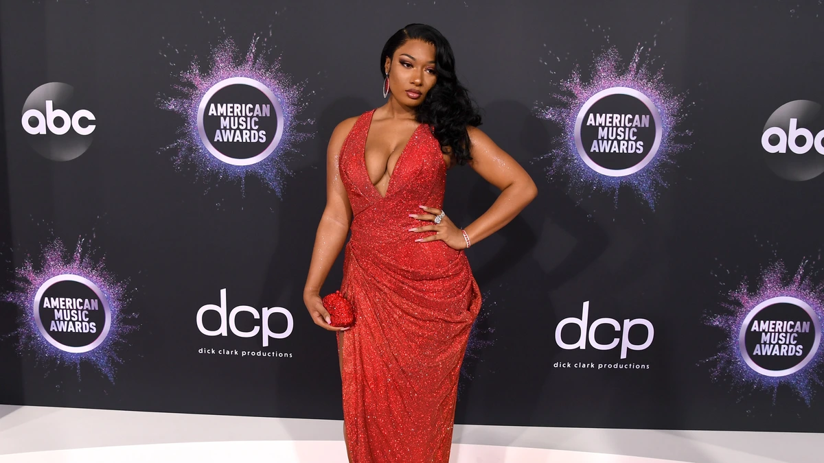 megan thee stallion red dress Megan Thee Stallion's Rose Water Nails Are Perfect for Spring
