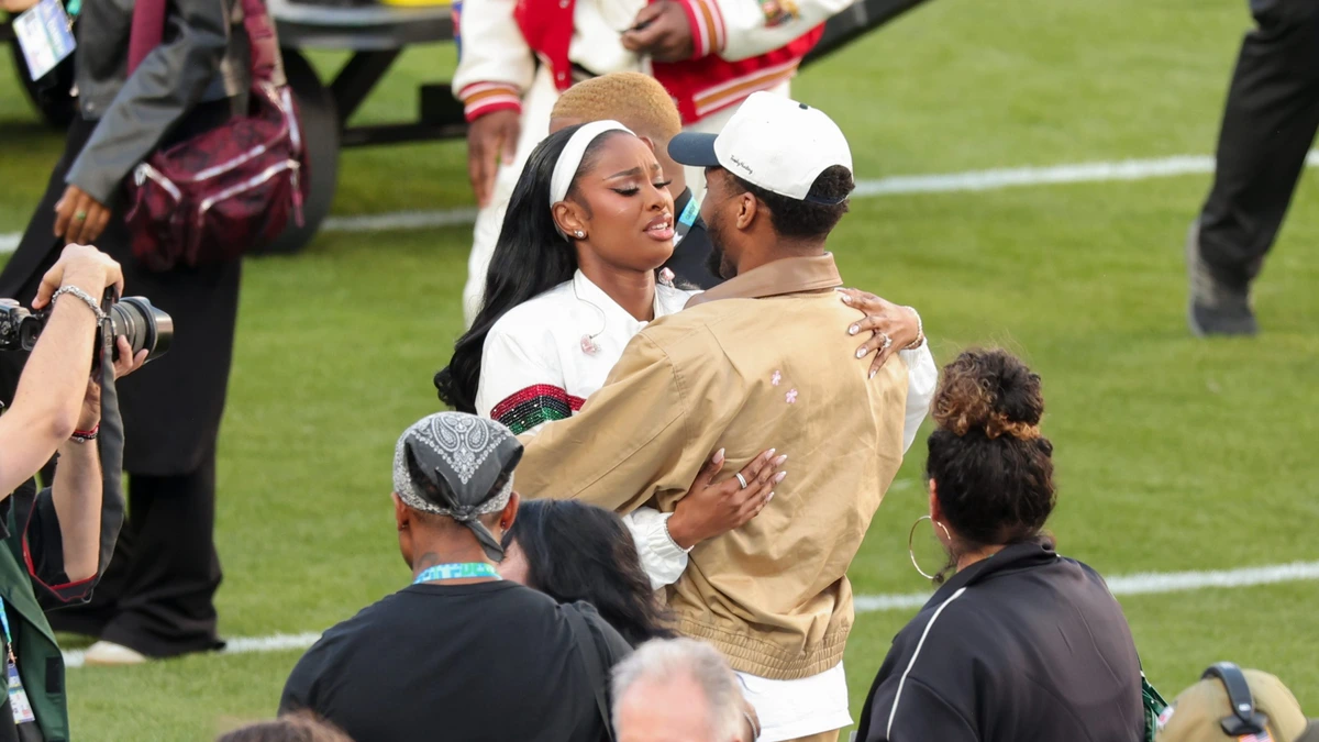 Coco Jones delivered a moving performance of "Lift Every Voice and Sing" at Super Bowl LX, with her fiancé, NBA star Donovan Mitchell, cheering her on enthusiastically from the sidelines.