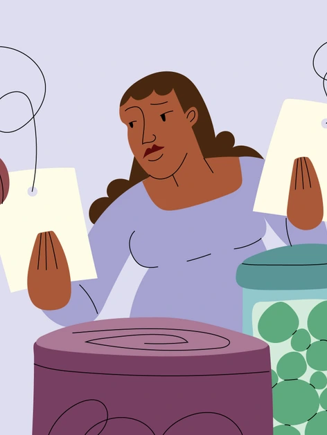 Woman of Color Compares Price Tags at Grocery Store During Economic Inflation