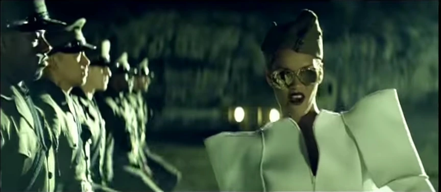 rihanna music video green dress Rihanna's Most Epic Looks Teal satin waterfall dress