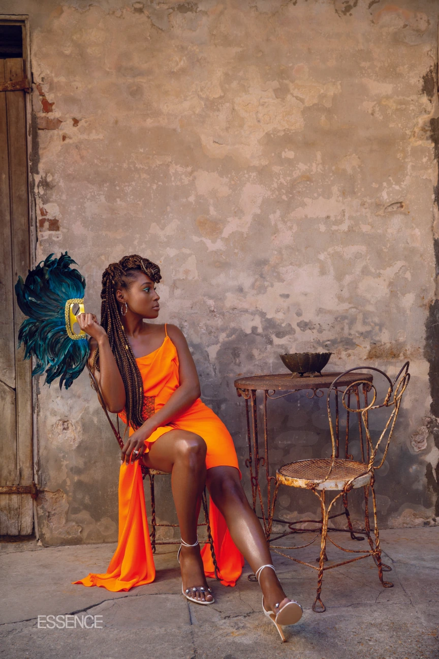 issa rae orange dress Issa Rae Was a Ray of Sunshine at the 2024 Golden Globes