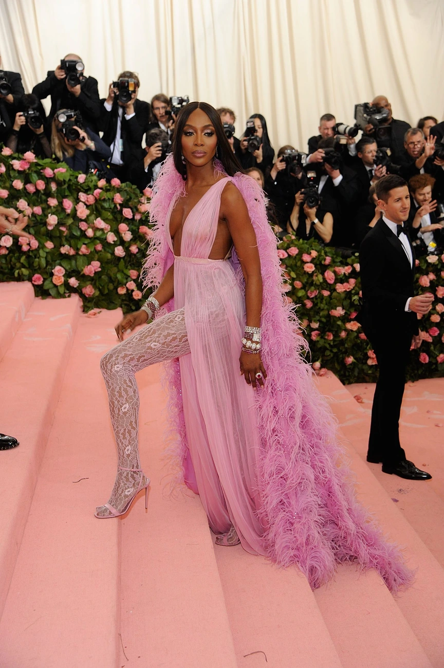 naomi campbell pink dress 50 of the Best Looks Worn by Naomi Campbell Over the Years