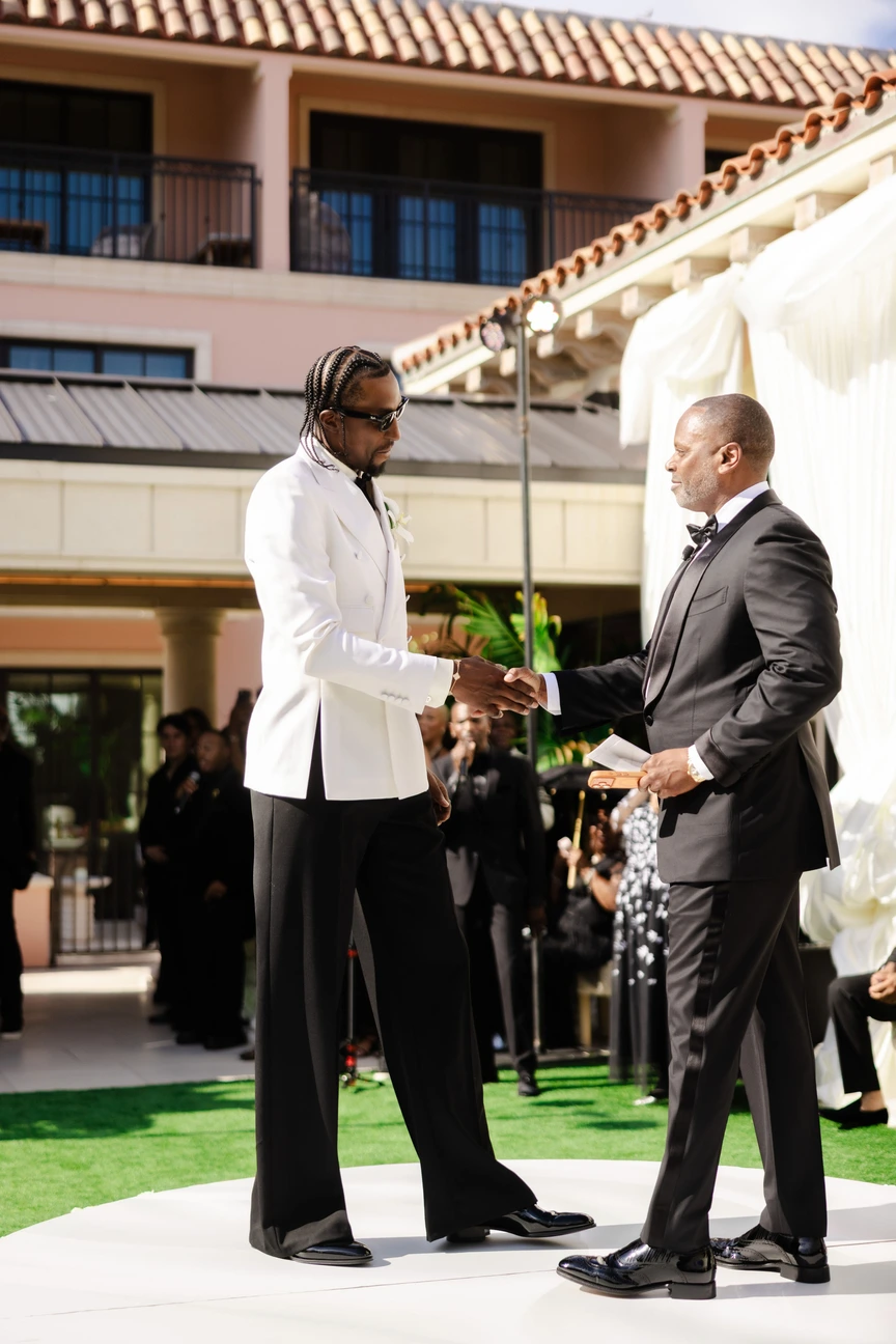 A Handshake With Pastor Touré Roberts