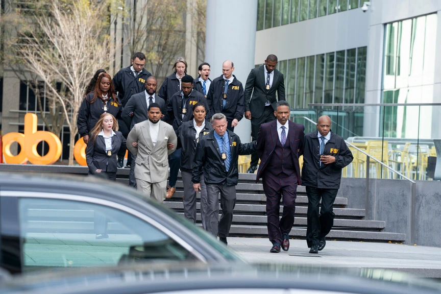 Charles Malik Whitfield as Jules (handcuffed near top left), Julian Horton as Roy (in gray suit) and Ricco Ross as Horace (handcuffed at right)