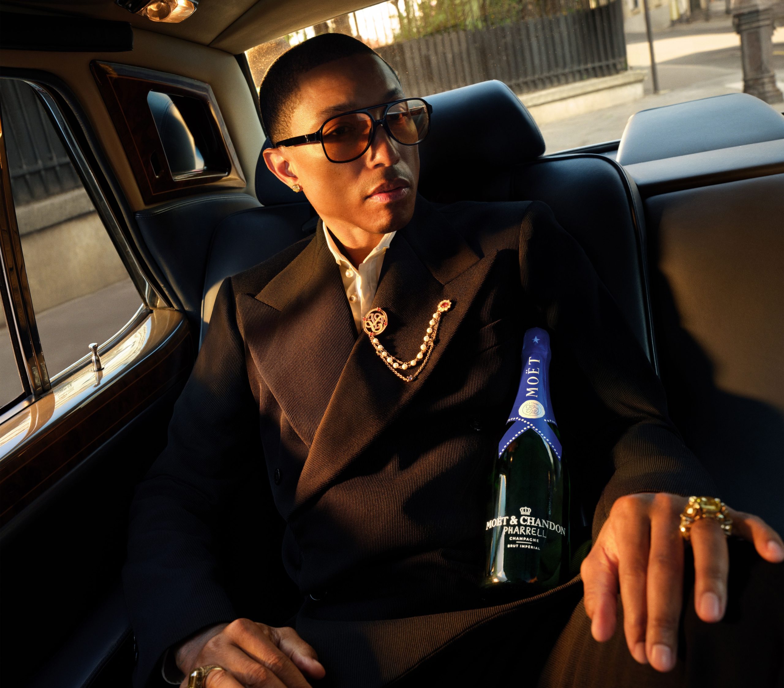 Pharrell Williams Brings His Impeccable Style To Bottles Of Moët