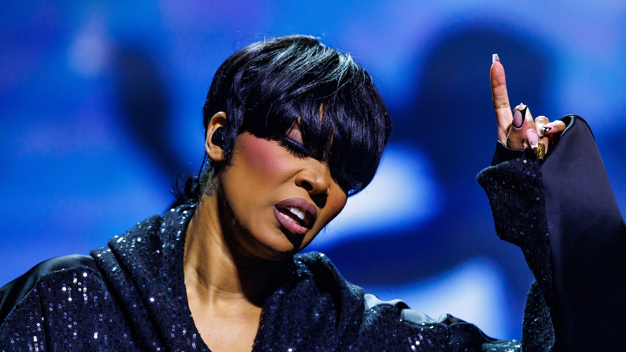 Three Wigs, One Set: How Monica’s Stylist Pulled Off Her ESSENCE Festival Quick Changes