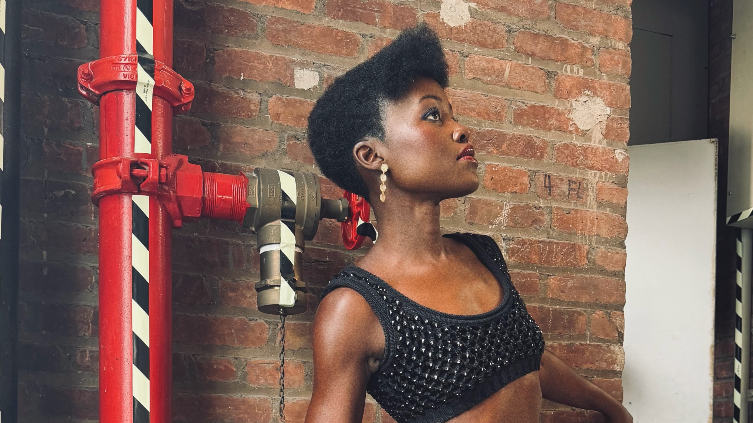 Why We’re Obsessed With Lupita Nyong’o’s Fringy Jimmy Fallon Look