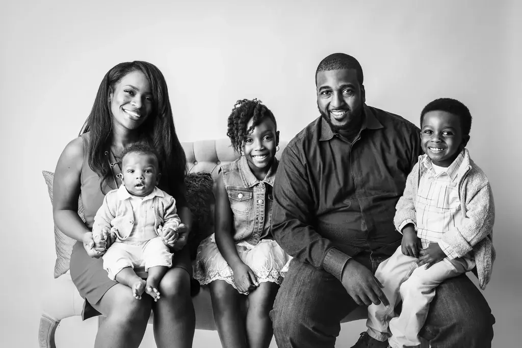 Claudia Walker with her family when her children were younger. Empowering our youth starts early. (Photo courtesy of Claudia Walker)