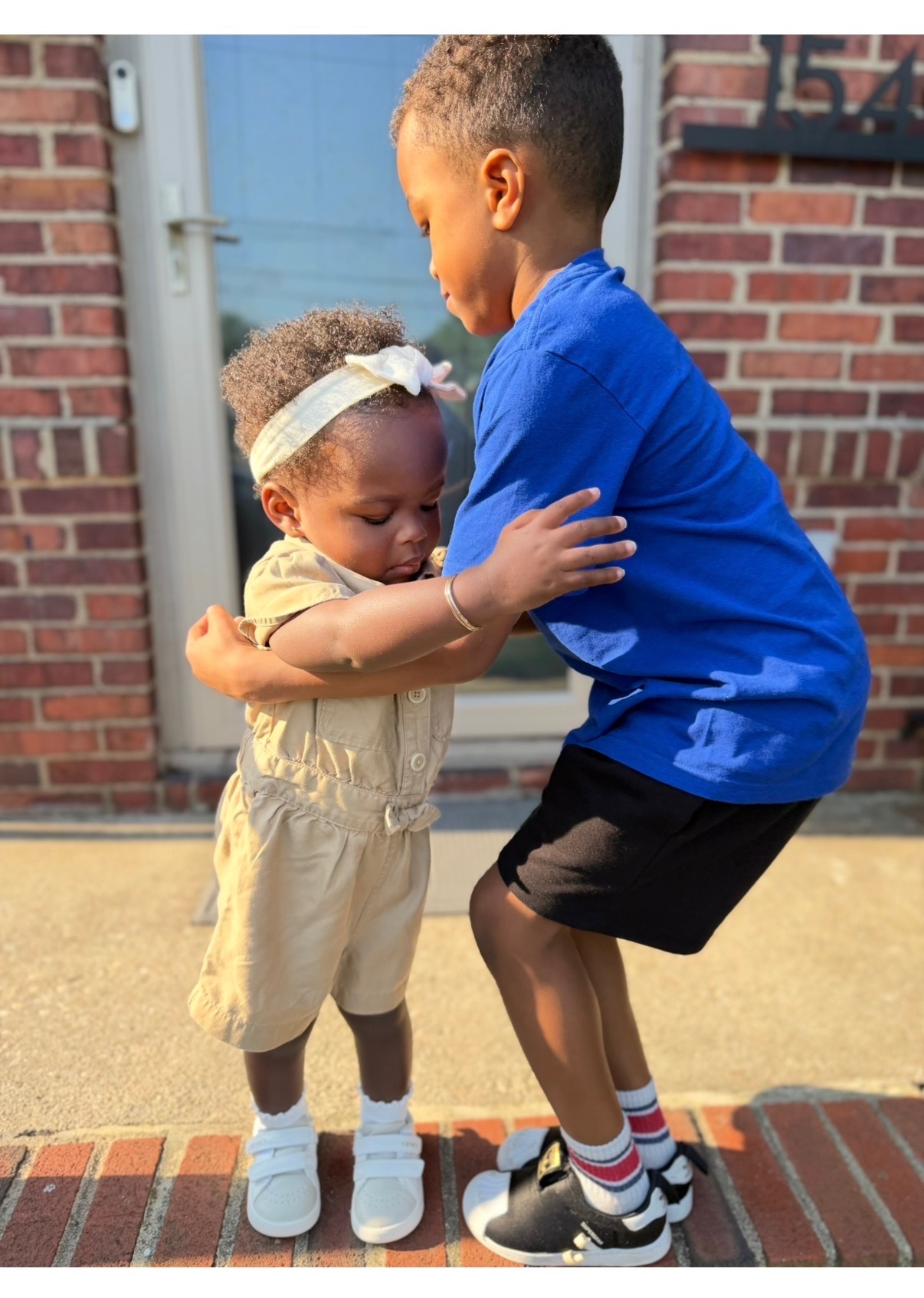 She's not heavy, she's my sister. (Photo courtesy of Whitney-Gayle Benta)