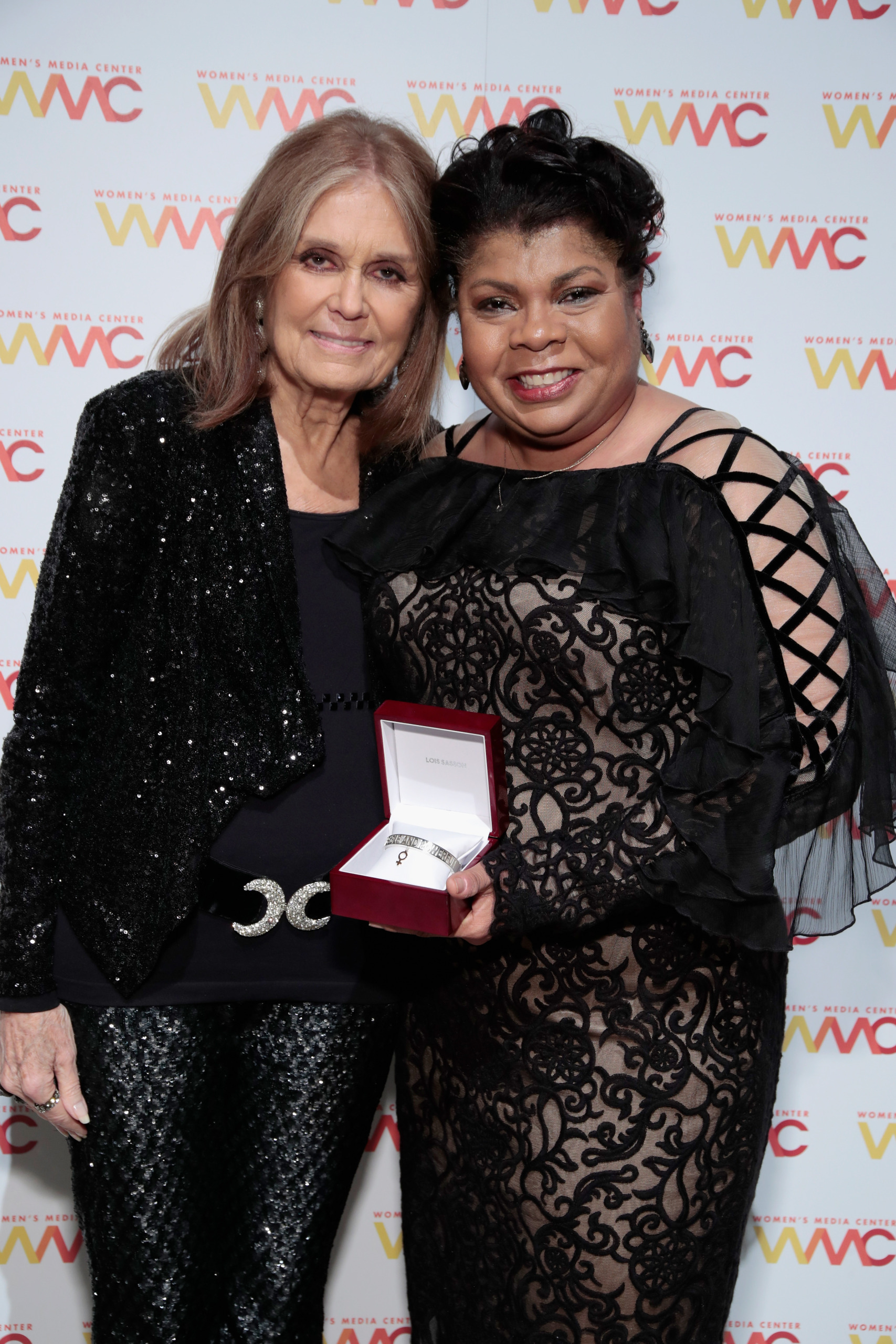 Gloria Steinem with journalist April Ryan holding the WMC She Persisted Award at the Women's Media Center 2017 Women's Media Awards on October 26, 2017 in New York City. (Photo by Cindy Ord/Getty Images for Women's Media Center)
