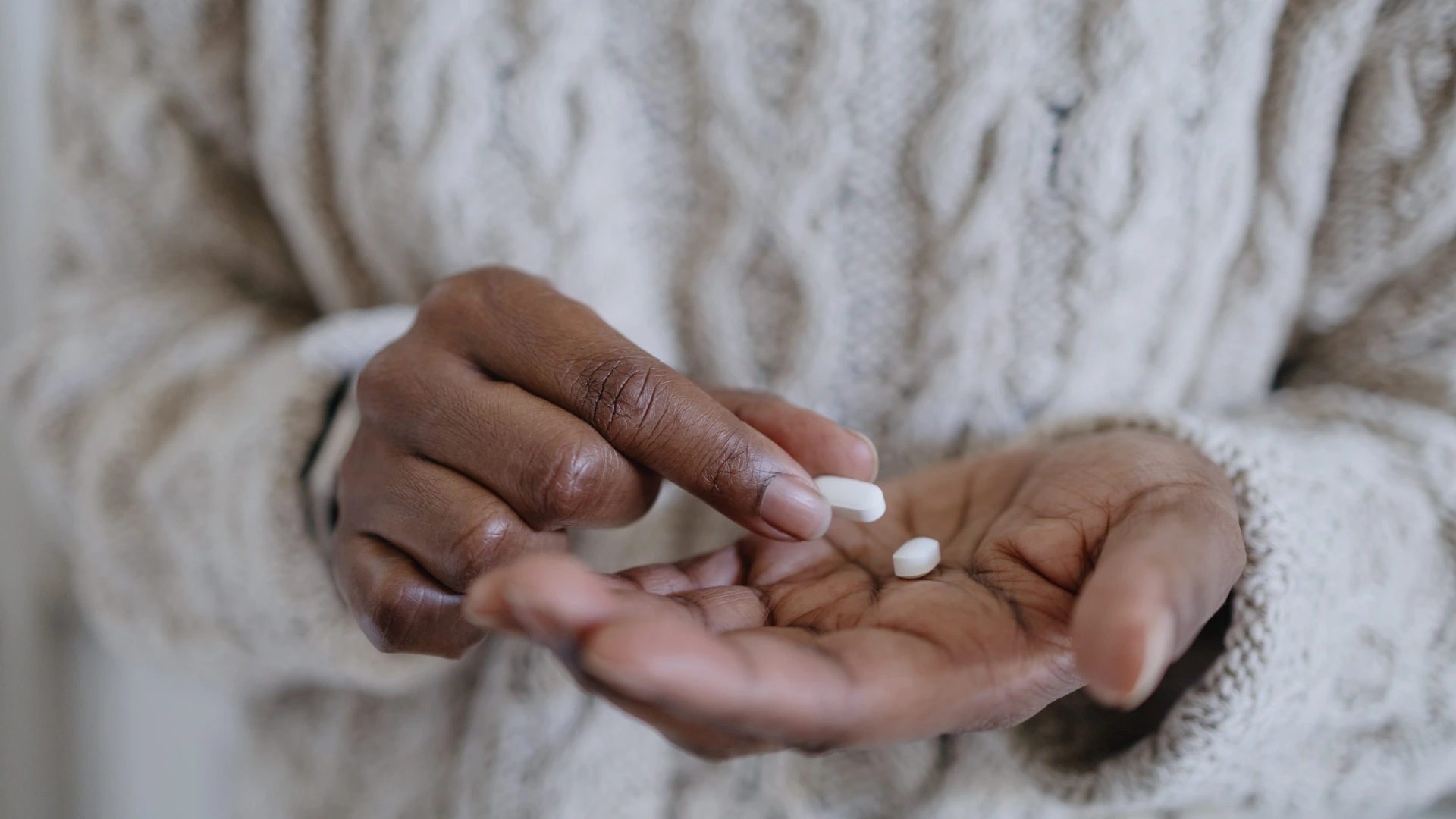 Woman Holds Pills