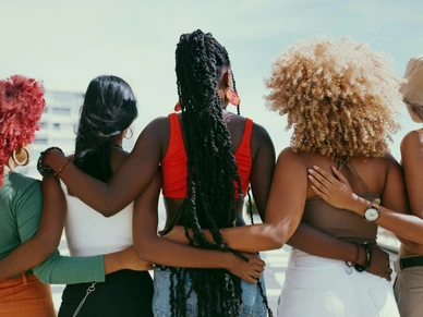 Shot of a group of unrecognizable girl friends in the city